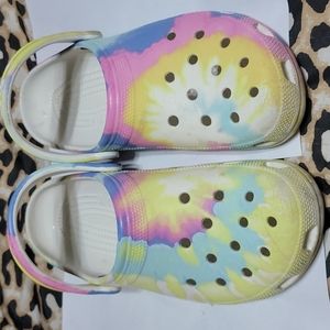 Men 9 Women 11 multi color worn Crocs As Is